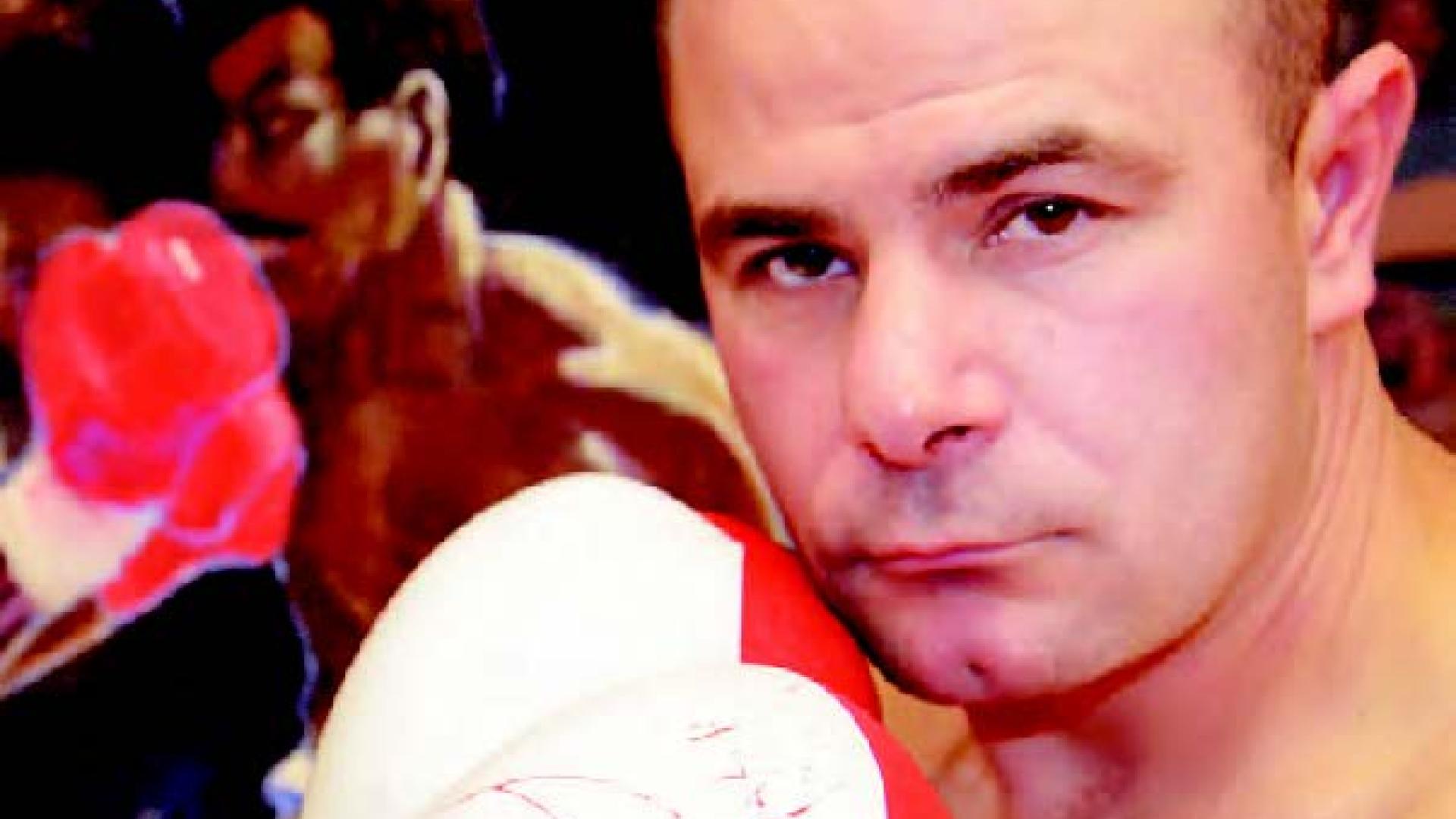 Rick Funk stands with his boxing gloves up and at the ready.